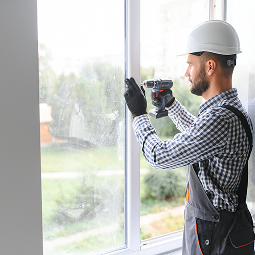 man working on windows